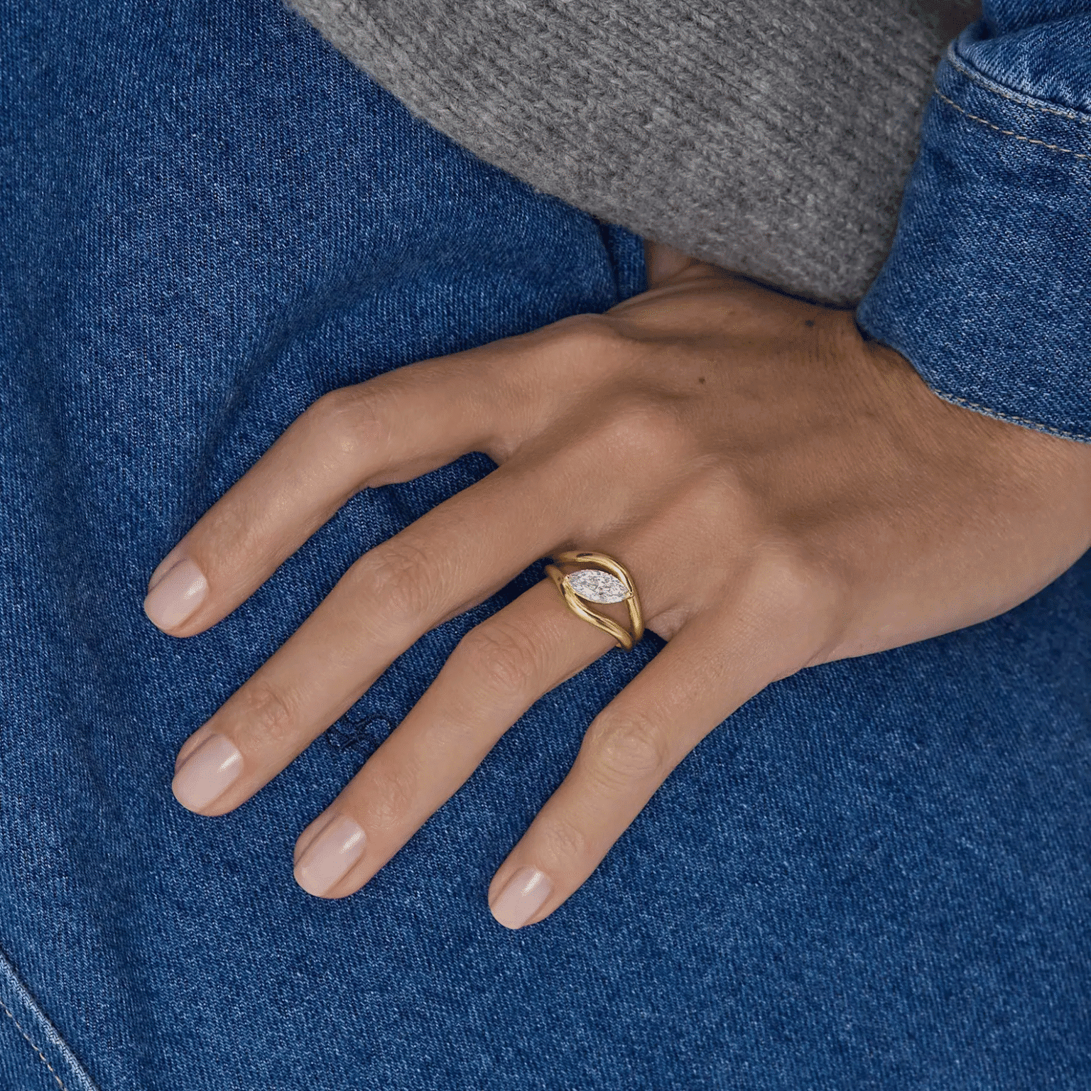 modern marquise lab grown diamond ring with sculptural gold band