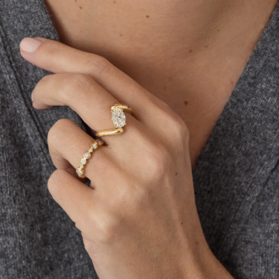 oval lab grown diamond engagement ring with sculpted gold band (2)