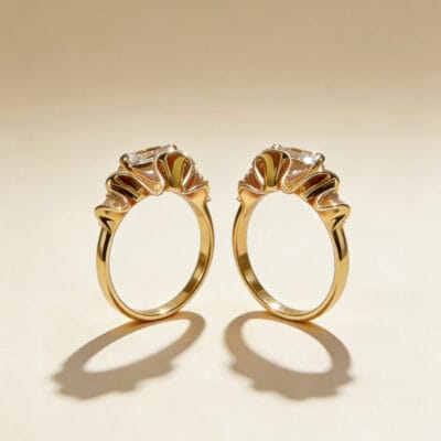 sculptural gold silk ribbon ring with east west radiant diamond51