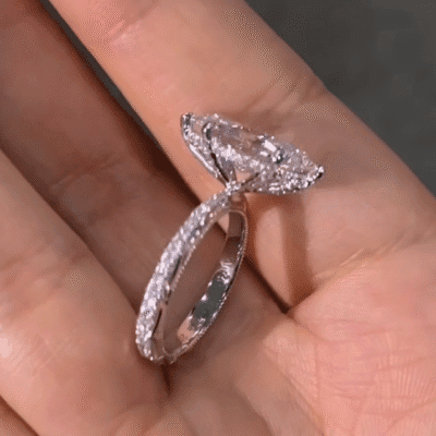 vintage marquise lab diamond ring with hidden halo and full engraved band