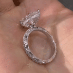 vintage marquise lab diamond ring with hidden halo and full engraved band