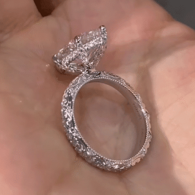 vintage marquise lab diamond ring with hidden halo and full engraved band