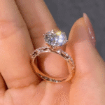 vintage round lab diamond solitaire ring with floral engraved band